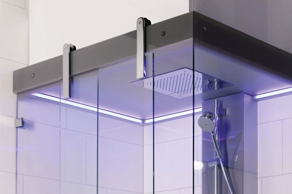 Steam door for recessed ceilings with a sliding steam shower door