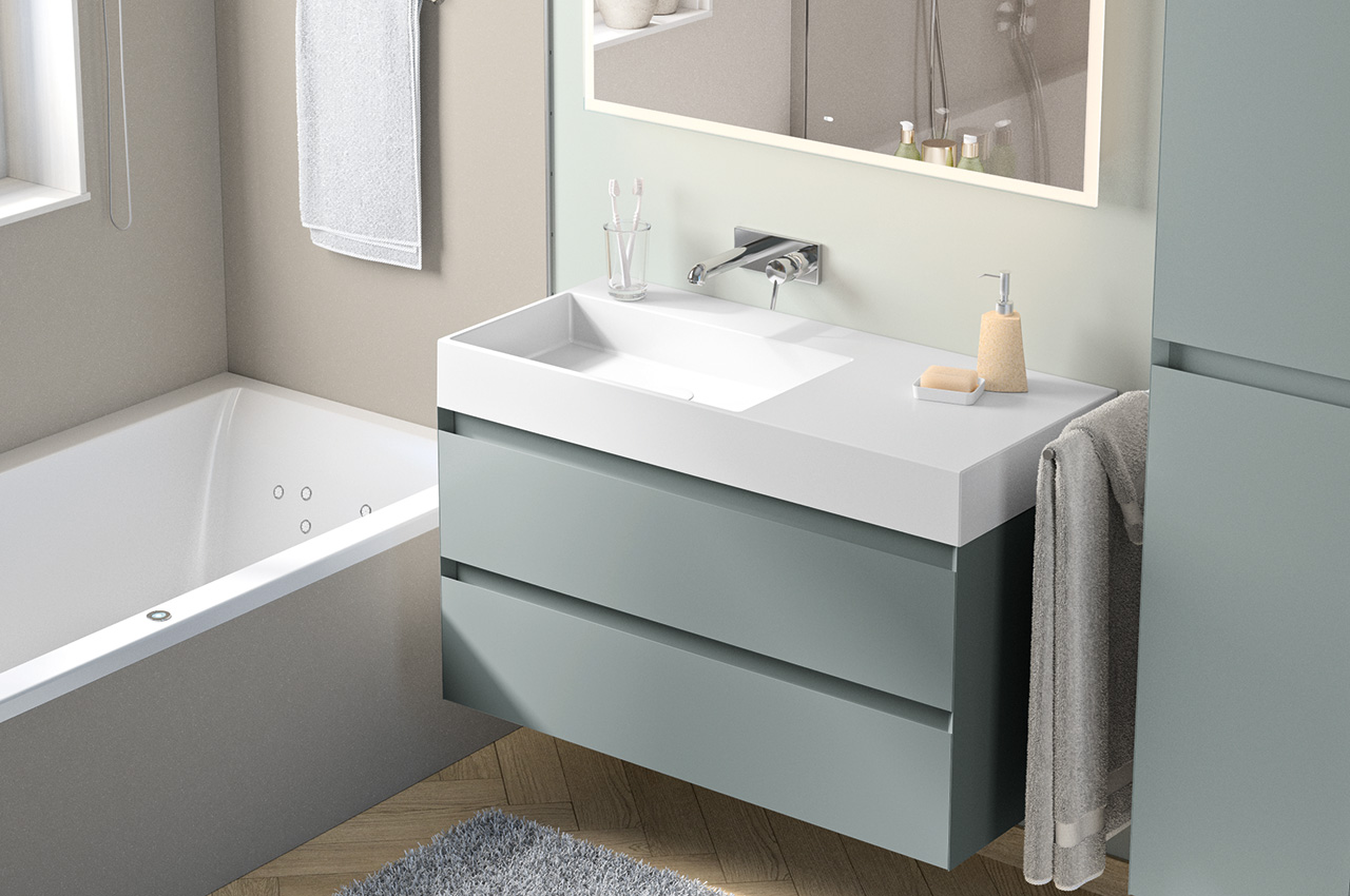 Modernes Badezimmer mit einem schwebenden Waschtisch mit zwei Schubladen, einem rechteckigen weißen Waschbecken, einem wandmontierten Wasserhahn, einem Seifenspender, einem Handtuch, einer Badewanne und einem unscharfen grauen Teppich auf einem Holzboden.