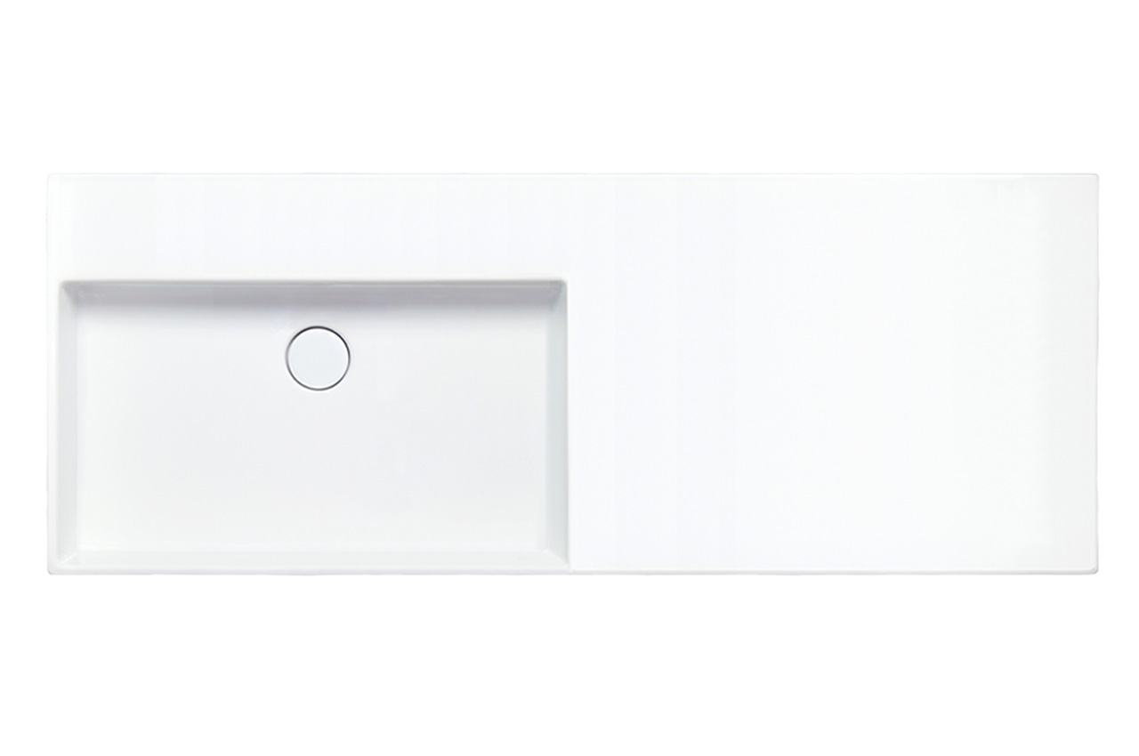 Ein rechteckiges weißes Waschbecken mit einem Ablauf auf der linken Seite und einer flachen, glatten Arbeitsfläche auf der rechten Seite. Das Design ist minimalistisch und modern.