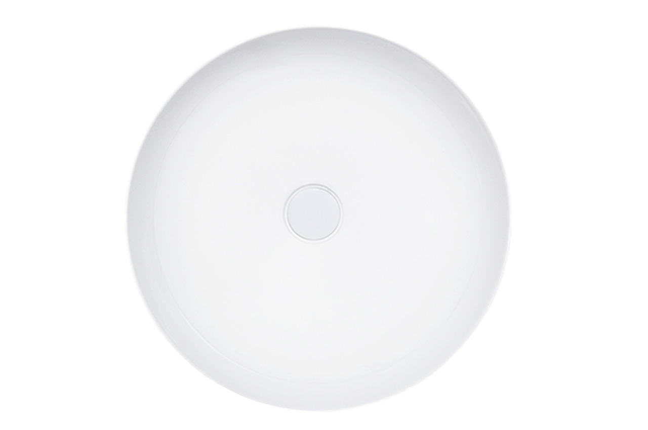 Eine schlichte, runde, weiße Keramikschale von oben gesehen auf weißem Hintergrund.